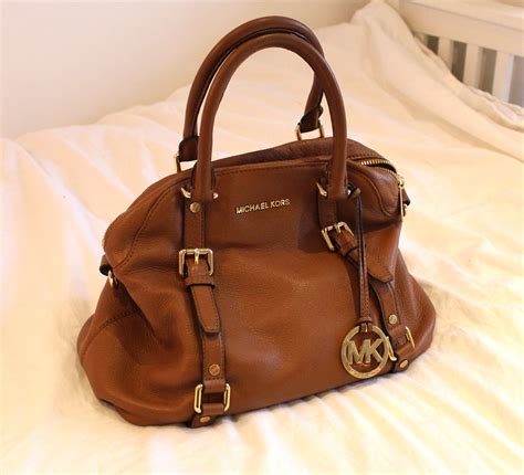 used michael kors purse price|buy used michael kors purses.